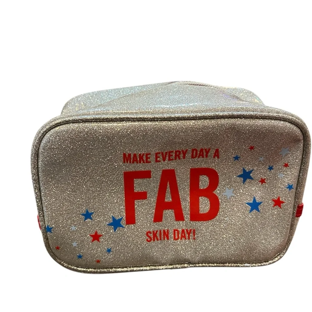 First Aid Beauty Glitter Makeup Bag - Red and Blue Accents. NWT